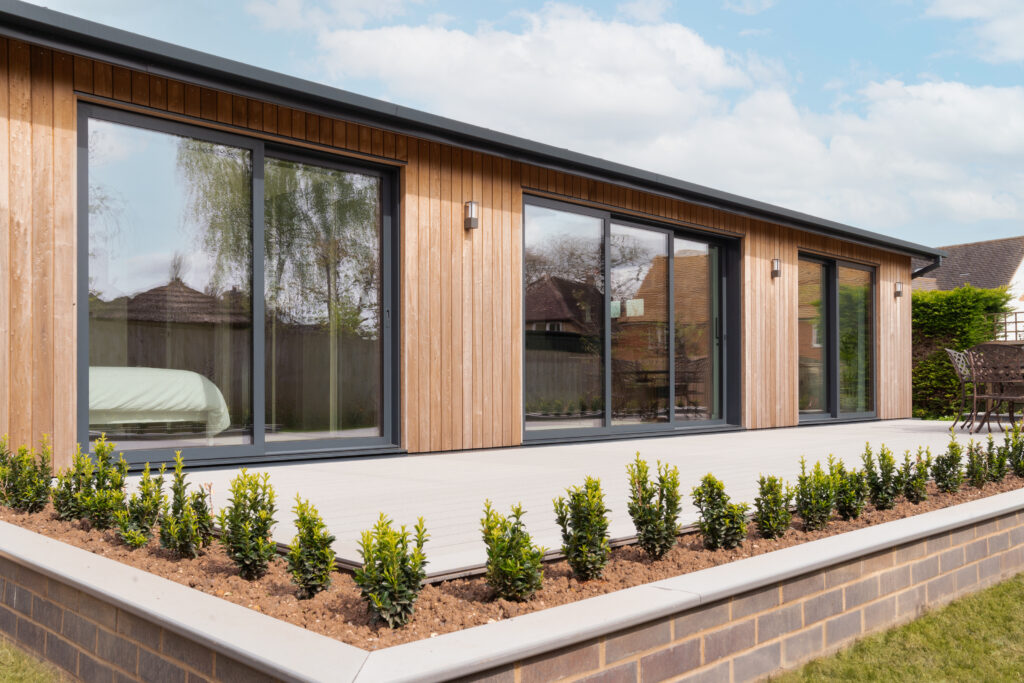 Brimstone poplar cladding, rear view of contemporary home