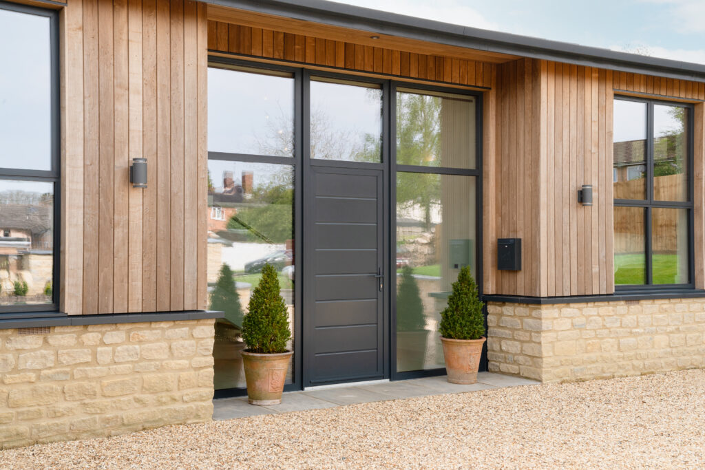 Brimstone poplar cladding door and window detail