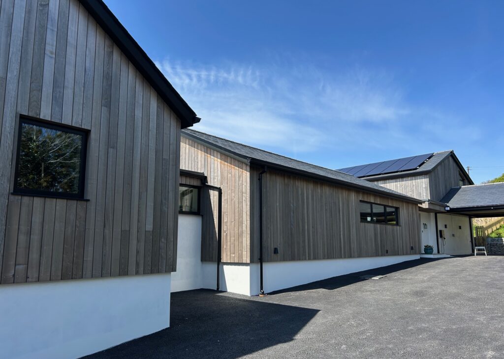 New build bungalow with Brimstone ash cladding on exterior