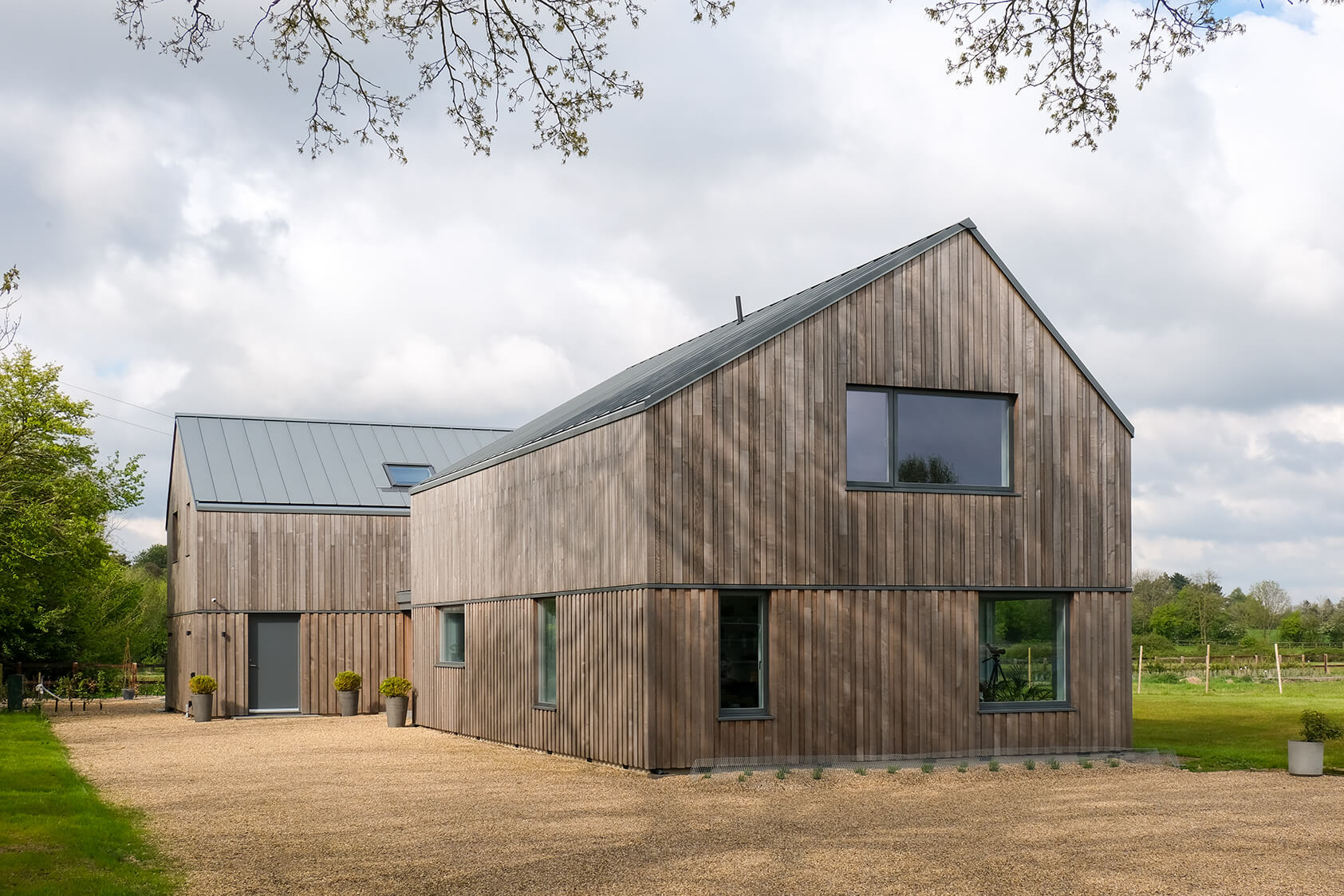 Case Study - Low Meadow - mixed width Brimstone Ash cladding