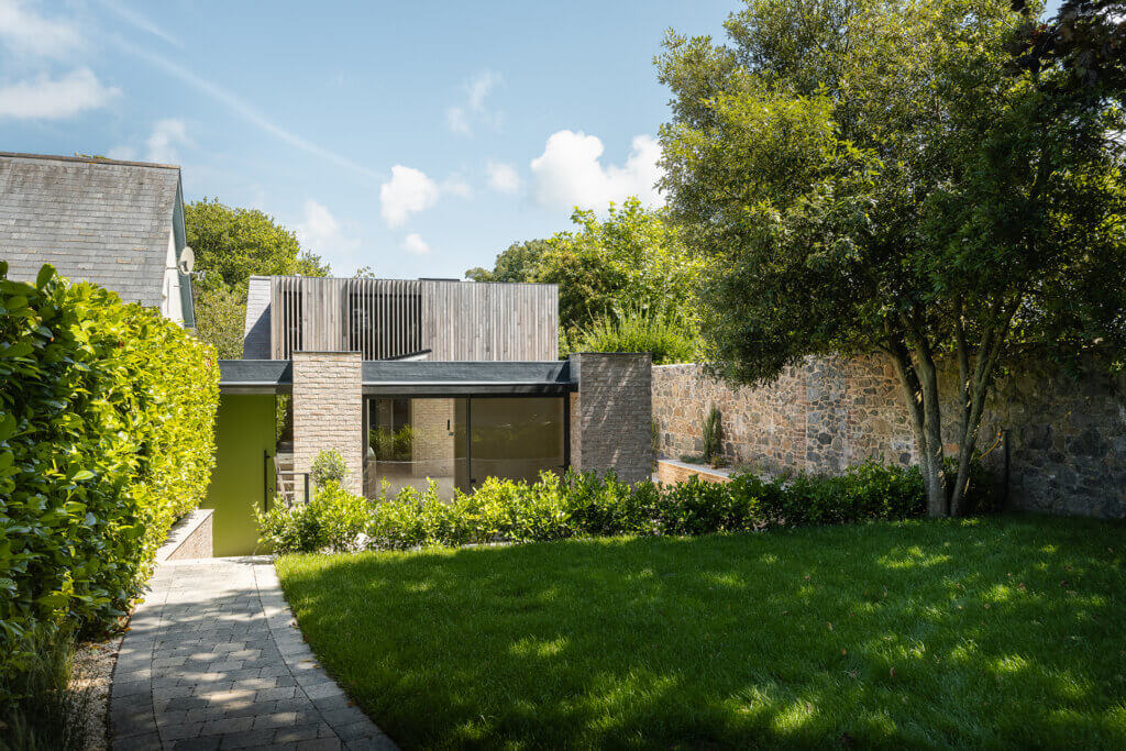 Tranquil contemporary barn development with Brimstone ash cladding